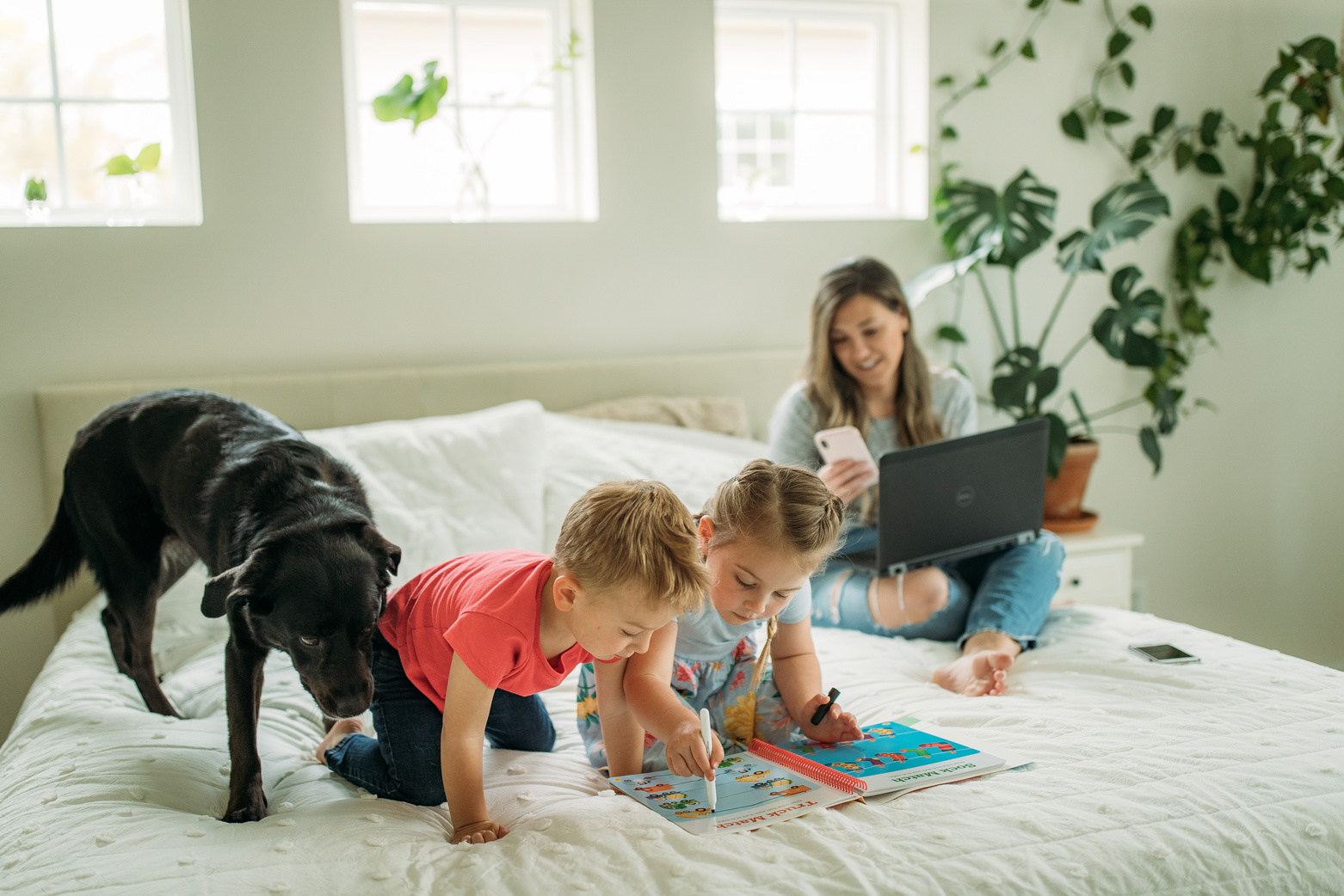 Woman Working from Home with Kids